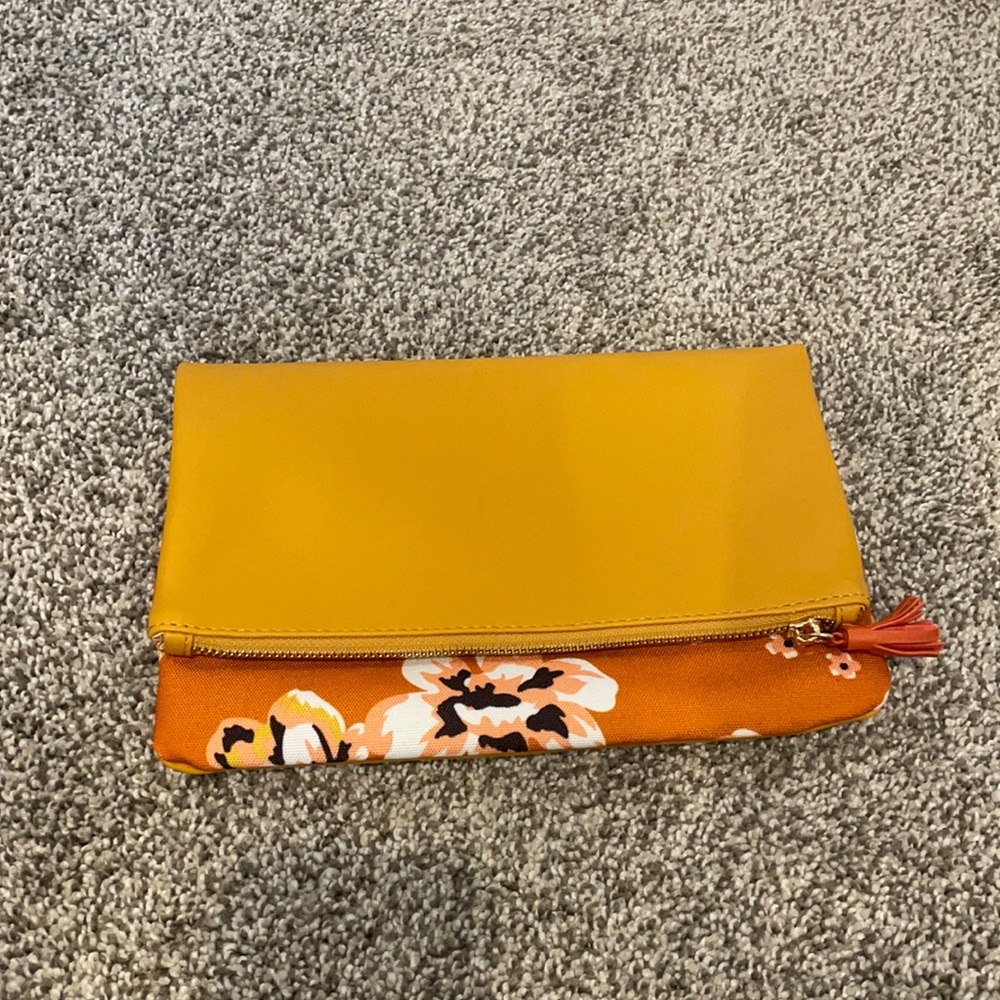 Floral orange reversible clutch